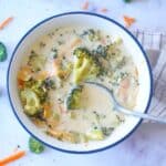 creamy keto broccoli cheddar soup with bits of carrots