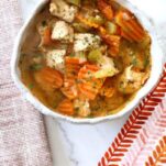 homestyle turkey soup with carrots in a bowl