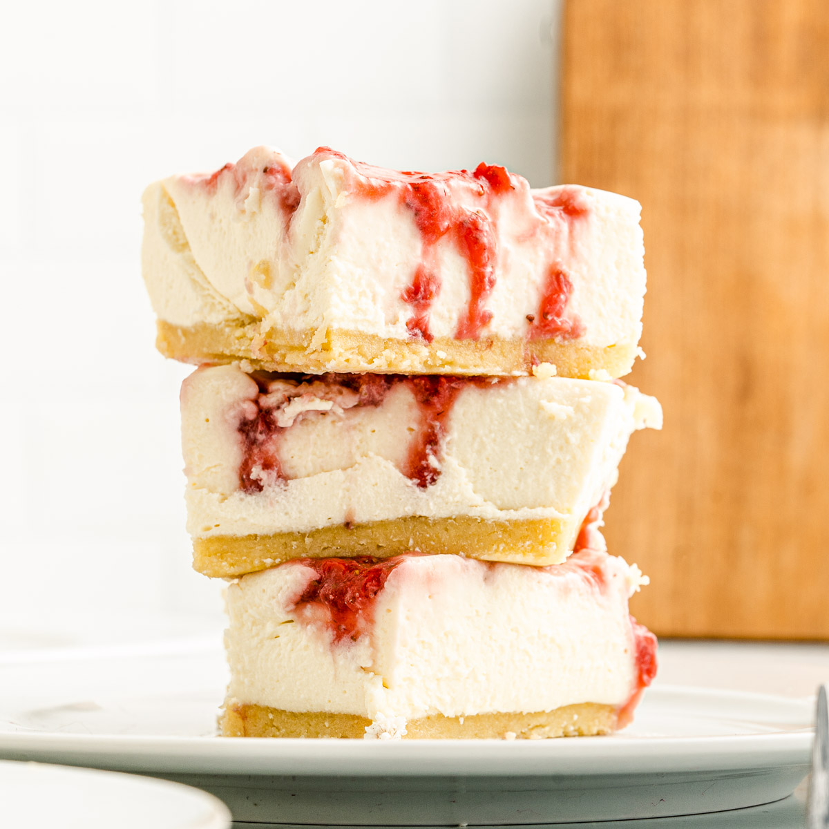 stack of no bake keto strawberry cheesecake bars